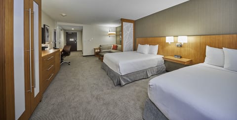 Desk, laptop workspace, blackout drapes, iron/ironing board