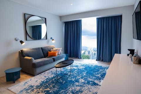 Suite, 1 Bedroom, Non Smoking | Living area | 55-inch LED TV with cable channels