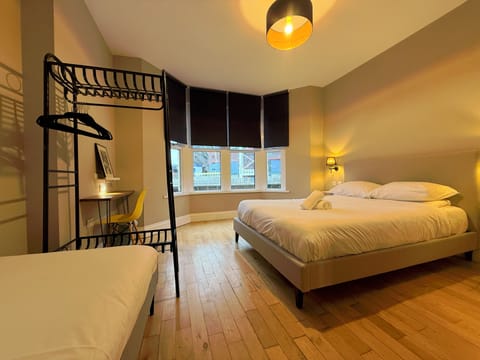 Signature Triple Room, Shared Bathroom | Desk, laptop workspace, soundproofing, iron/ironing board