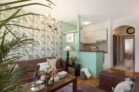 Deluxe Apartment, 2 Bedrooms, Balcony | Living area | Flat-screen TV, DVD player