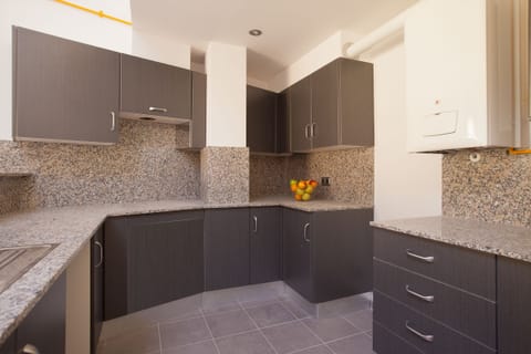 Apartment, 3 Bedrooms | Private kitchen | Full-size fridge, microwave, oven, stovetop