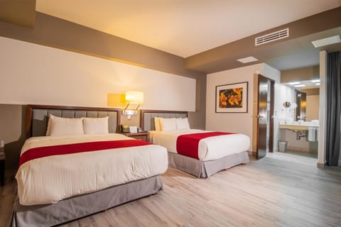 Standard Room, 2 Queen Beds, Non Smoking (Pet Friendly) | Minibar, in-room safe, desk, laptop workspace