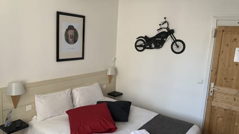 Blackout drapes, iron/ironing board, free WiFi, bed sheets