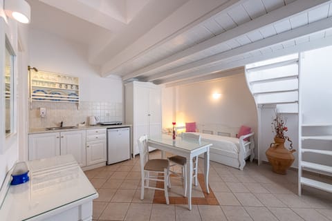 Suite | Private kitchen | Fridge, coffee/tea maker, electric kettle, highchair