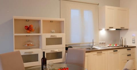 Panoramic Suite, Sea View | Private kitchenette | Fridge, stovetop, electric kettle, highchair