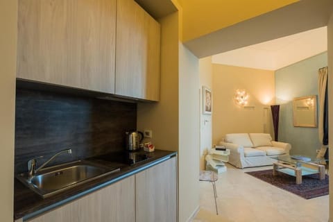 Panoramic Suite | Private kitchen | Full-size fridge, coffee/tea maker, electric kettle