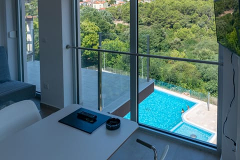 Suite, 2 Bedrooms, Balcony | Minibar, in-room safe, desk, free WiFi