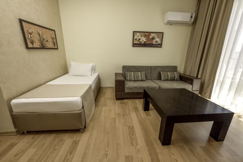 Family Room, 1 Bedroom, Pool View | Premium bedding, free minibar items, in-room safe, desk