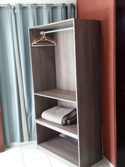 Apartment, 1 Bedroom | Minibar, individually decorated, desk, iron/ironing board