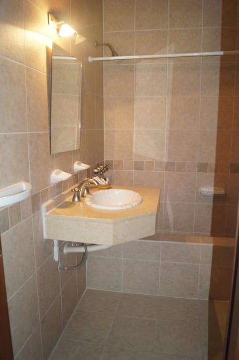 Combined shower/tub, free toiletries, hair dryer, bathrobes