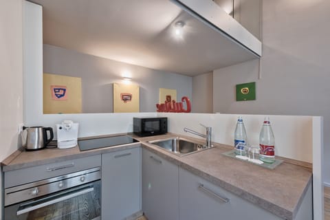 Comfort Apartment, 2 Bedrooms, 2 Bathrooms, Garden View | Private kitchen | Fridge, espresso maker, electric kettle, highchair