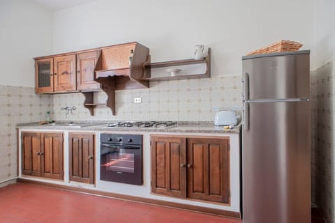 Apartment, 3 Bedrooms | Private kitchen | Full-size fridge, oven, stovetop, dishwasher