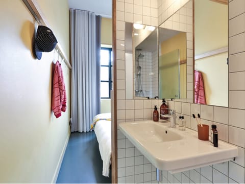 Shower, rainfall showerhead, eco-friendly toiletries, hair dryer