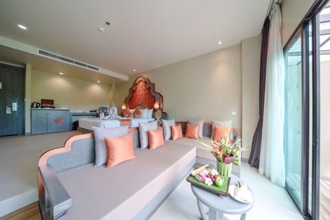 Deluxe Room with Pool Access | Living area | 32-inch flat-screen TV with cable channels, TV