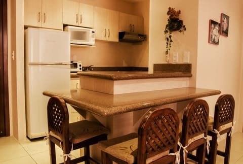 Apartment | Private kitchen | Full-size fridge, microwave, stovetop, coffee/tea maker