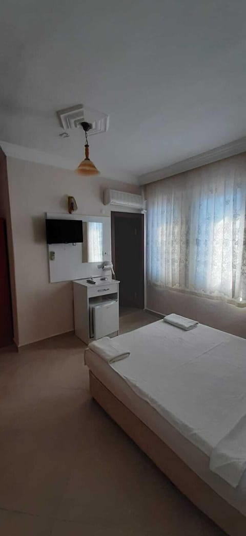 Standard Double Room | Minibar, iron/ironing board, free cribs/infant beds, free WiFi