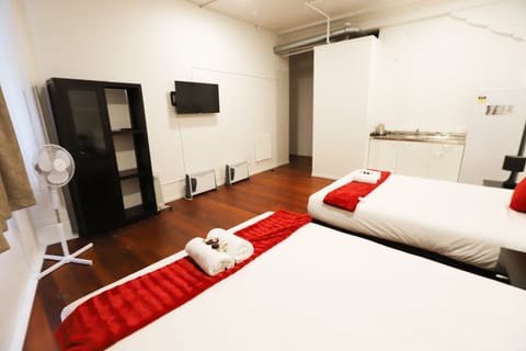 Basic Twin Room, Multiple Beds, Private Bathroom | Free WiFi, bed sheets