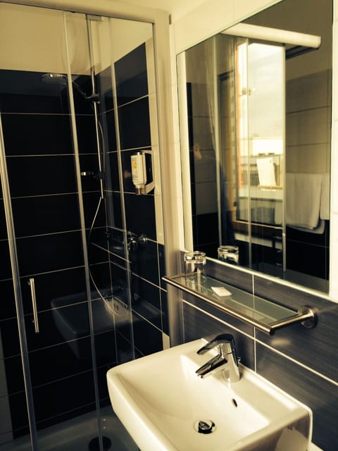 Shower, free toiletries, hair dryer, towels