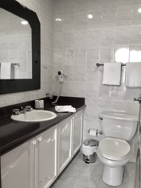 Superior Triple Room, Private Bathroom, Garden Area | Bathroom | Combined shower/tub, deep soaking tub, free toiletries, hair dryer