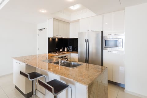 3 Bedroom Apartment | Private kitchen | Full-size fridge, microwave, oven, stovetop