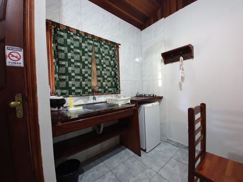 Family Chalet | Private kitchen | Stovetop, highchair, cookware/dishes/utensils