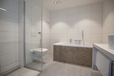 Luxury Room, Bathtub (Shower) | Bathroom | Shower, eco-friendly toiletries, hair dryer, towels