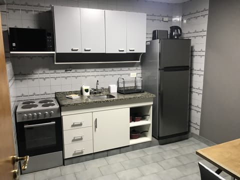 Comfort Apartment, 2 Bedrooms, Garden View | Private kitchen | Full-size fridge, microwave, oven, stovetop