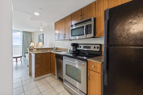 One Bedroom Deluxe Suite- 1 King Bed, Oceanfront, Private Balcony, Full Kitchen | Private kitchen | Fridge, microwave, stovetop, coffee/tea maker