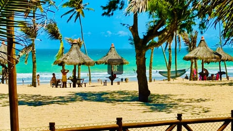 On the beach, white sand, free beach cabanas, sun loungers