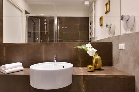Double Room | Bathroom amenities | Shower, free toiletries, hair dryer, slippers