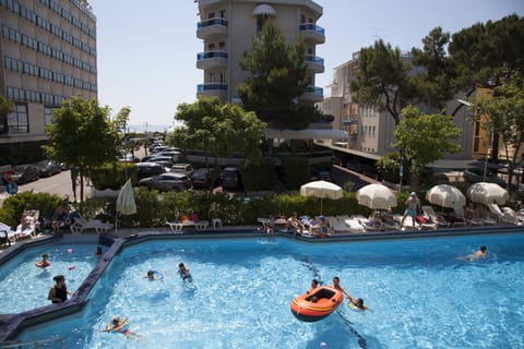 Seasonal outdoor pool, pool umbrellas, sun loungers