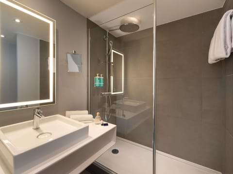 Eco-friendly toiletries, hair dryer, towels