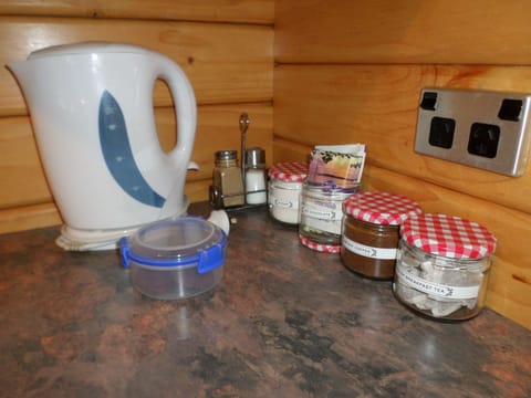 Microwave, stovetop, coffee/tea maker, electric kettle