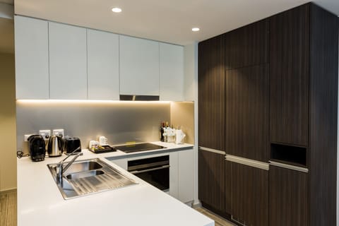 1 Bedroom Bournemouth Suite (Balcony) | Private kitchen | Full-size fridge, microwave, oven, stovetop