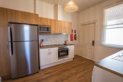 1 Bedroom Apartment | Private kitchen | Fridge, electric kettle