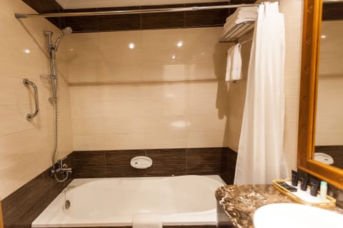 Shower, free toiletries, hair dryer, slippers