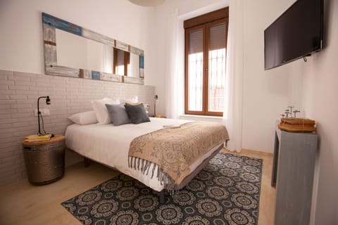 Apartment, 1 Bedroom, Ground Floor (Casa Mariana 1) | Iron/ironing board, free WiFi, bed sheets