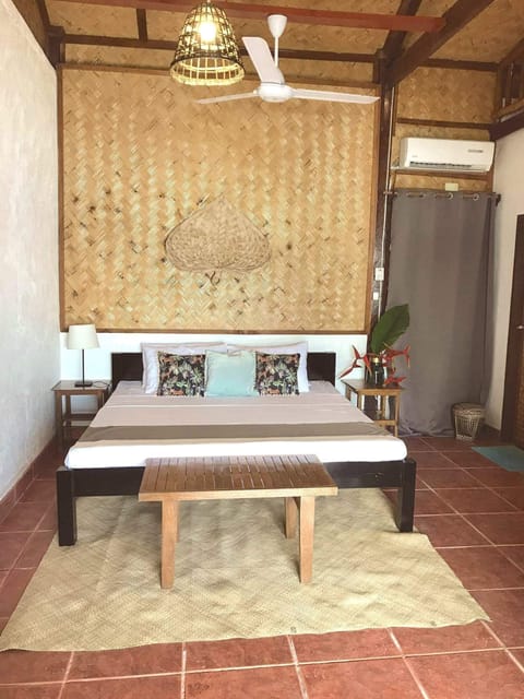 Beachfront Cottage | Minibar, in-room safe, individually furnished, desk