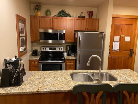 Condo, 2 Bedrooms | Private kitchen | Full-size fridge, microwave, oven, stovetop