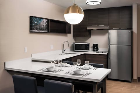 Studio, Multiple Beds | Private kitchen | Full-size fridge, microwave, stovetop, dishwasher