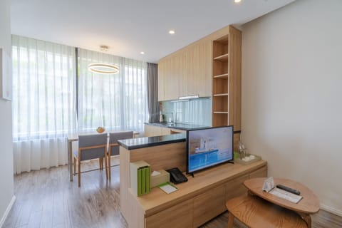 Residence, Partial Sea View | Minibar, in-room safe, desk, blackout drapes