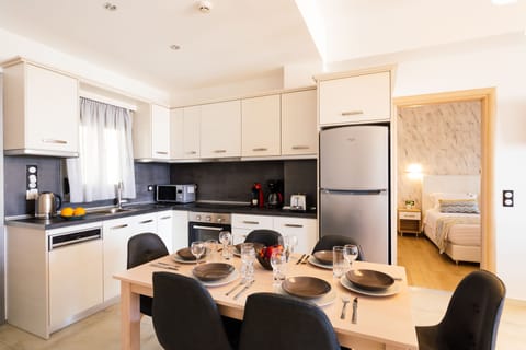 Executive Apartment, 2 Bedrooms, Sea View | Private kitchen | Full-size fridge, microwave, oven, stovetop