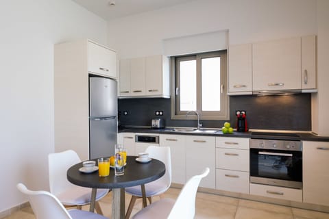 Family Apartment, 1 Bedroom | Private kitchen | Full-size fridge, microwave, oven, stovetop