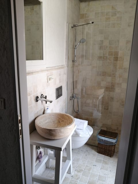 Shower, free toiletries, hair dryer, slippers