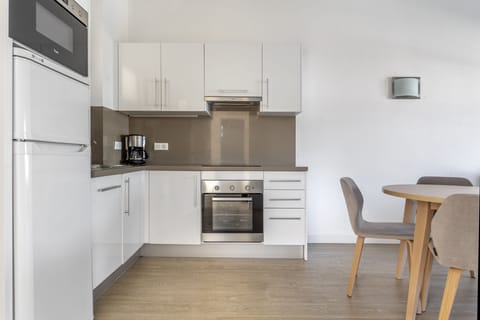 Apartment, 1 Bedroom | Private kitchen | Fridge, microwave, stovetop, coffee/tea maker