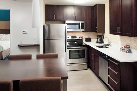 Suite, 2 Bedrooms, Balcony | Private kitchenette | Full-size fridge, microwave, stovetop, dishwasher