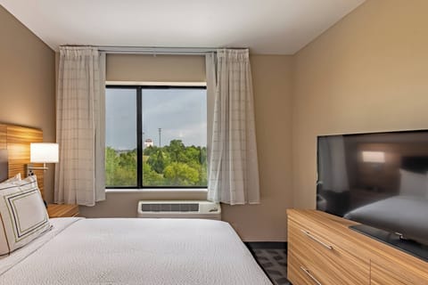 Suite, 1 Bedroom | Desk, laptop workspace, blackout drapes, iron/ironing board