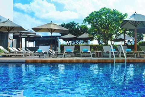 Outdoor pool, pool umbrellas, sun loungers