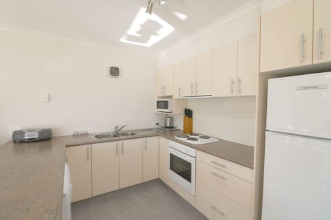 2 Bedroom Apartment | Private kitchen | Full-size fridge, microwave, oven, stovetop