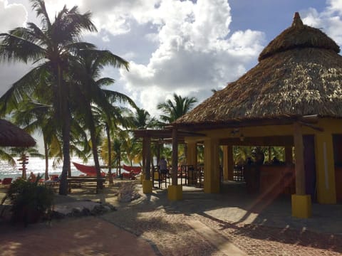 On the beach, white sand, sun loungers, beach umbrellas